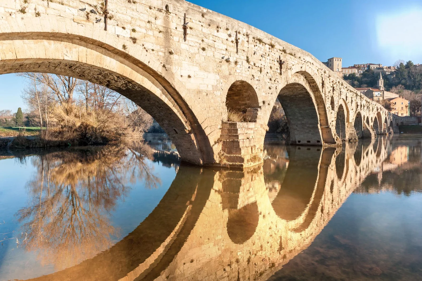 Pont Vieux reflected in the Orb river at Béziers